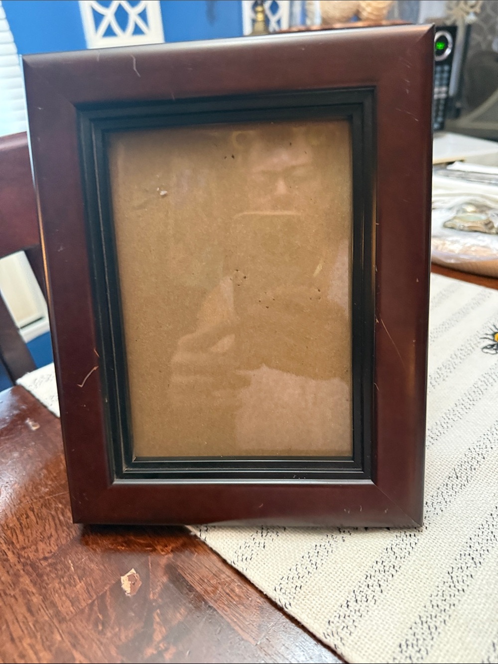 Elegant Brown Wood Door Mat with Black Trim picture frame